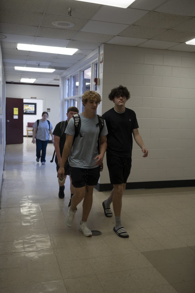 Students walking down the hallway.